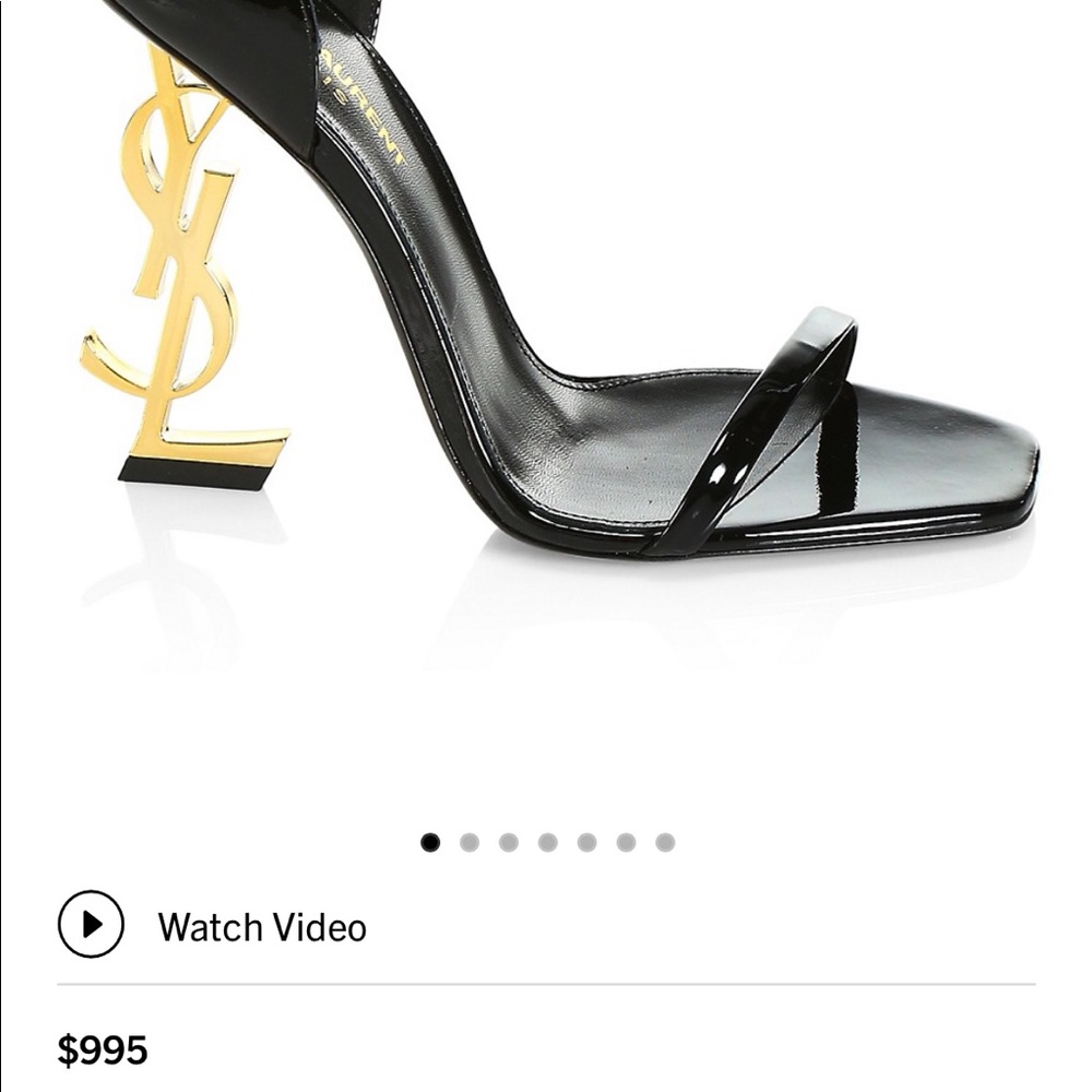 Black patent leather YSL heels with gold tone YSL . Gently Used